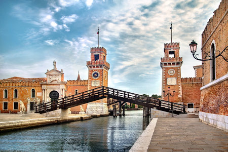 arsenal building and water channel in venice in italyの写真素材