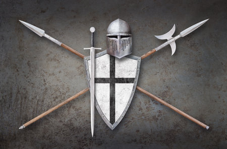 knight's helmet shield with black cross sword and two lances on grunge backgroundの写真素材