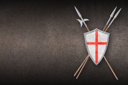 white shield with red cross lances and halberd on grunge backgroundの写真素材