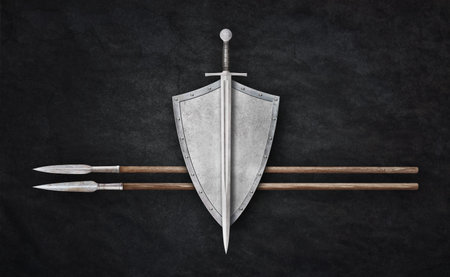 sword shield and two lances on grunge background