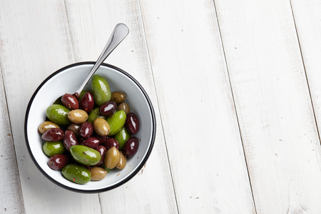 Greek olives in a bowlの写真素材