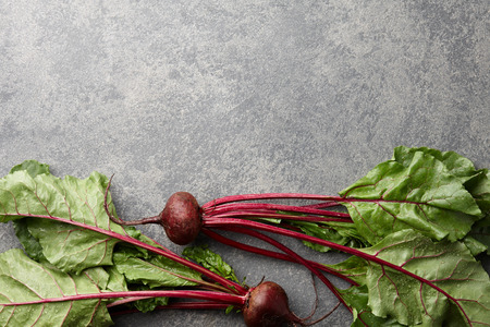 Fresh harvested beetroot on stone background, top viewの写真素材
