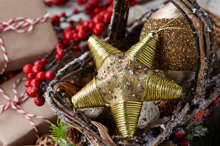 Christmas golden star and holiday decorationsの写真素材