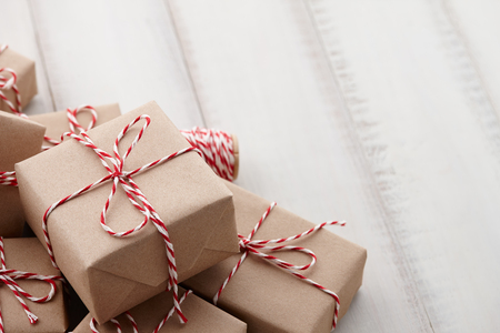 Christmas gift or present boxes wrapped in kraft paperの写真素材