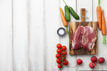 Raw duck breast and fresh vegetablesの写真素材
