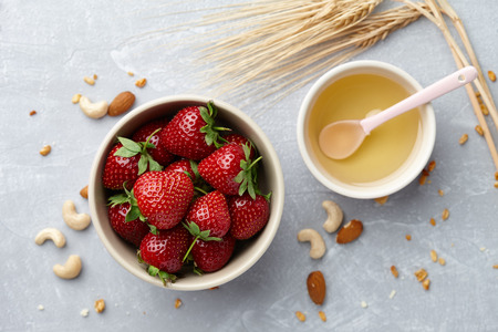 Healthy breakfast with strawberry and honeyの写真素材