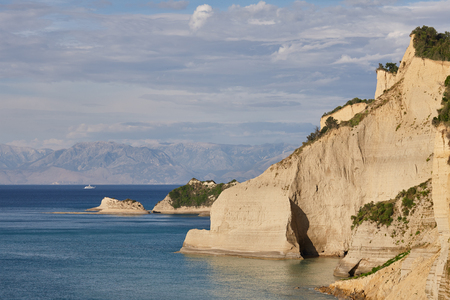Beautiful coastline with cliffs in Corfu, Greece. Unique geological formations in Peroulades region.の写真素材