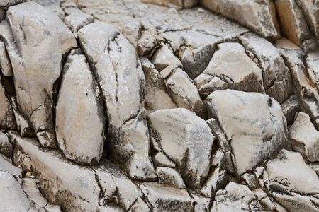 Cliff rock texture in Corfu island, Greece. Abstract stone background.の写真素材