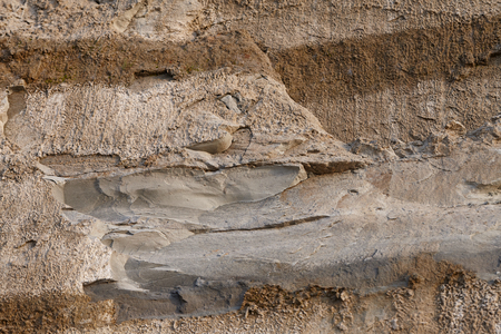 Cliff rock texture close up view of famous Cape Drastis geological formations in Corfu island, Greeceの写真素材
