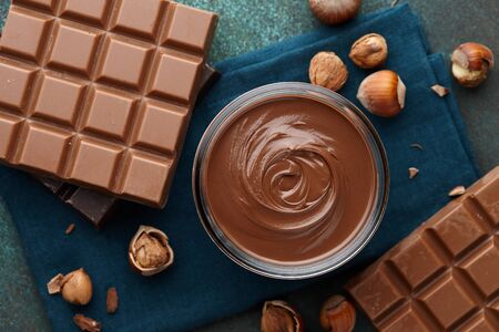 Chocolate spread or nougat cream with hazelnuts in Christmas timeの写真素材
