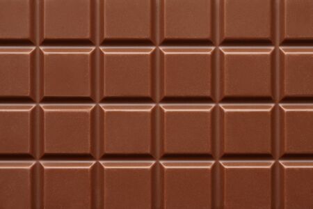 Milk chocolate bar background, close up viewの写真素材