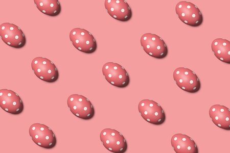 Trendy Easter pattern with pink eggs in dots on pink background, holiday conceptの写真素材