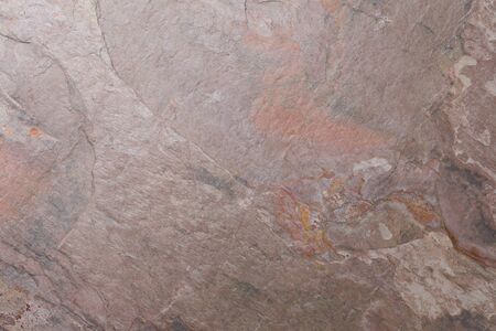 Reddish slate texture background, empty stone tabletopの写真素材