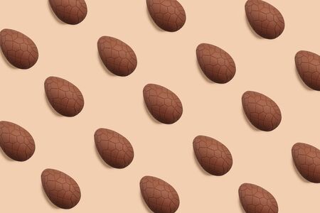 Trendy Easter pattern with chocolate eggs, holiday conceptの写真素材