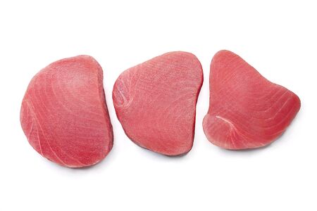 Fresh raw tuna steaks isolated on white background, top viewの写真素材