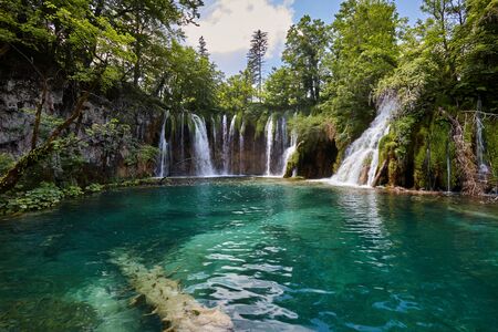 Waterfalls and crisp clean lakes of Plitvice National Park in Croatiaの写真素材