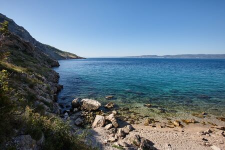 Beautiful Adriatic sea shore with rocks in Croatiaの写真素材