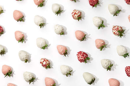Chocolate dipped strawberries pattern on white backgroundの写真素材