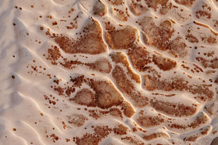Natural travertine stone close up in Pamukkale, Turkey. Abstract background.の写真素材
