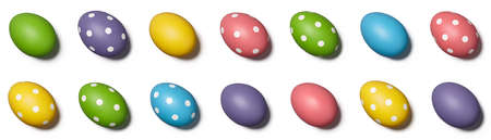 Collage of painted Easter eggs isolated on white background. Big collection of colorful decorations.の写真素材