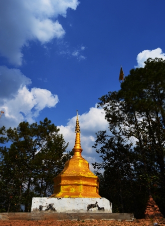 Gloden Phra That on Hill above Village Series 1_3, Buddha Image, Cloud and Blue Sky, Chiang Mai province, Thailandの写真素材