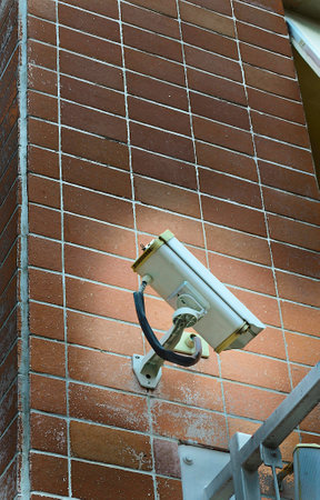 The CCTV camera secure monitor set on the wall to watch and record anything の写真素材