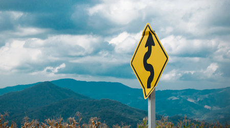 The Curve Traffic Sign Blur Landscape Background の写真素材