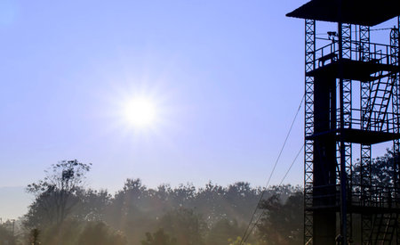 The Sunrise and 34-foot tower to practice Parachute Dril.の写真素材