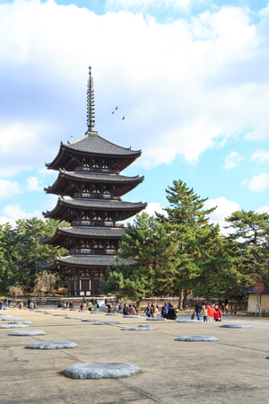 Nara, Japan - November 28, 2015: Kofukuji use to be the family temple of the Fujiwara, the most powerful family clan during much of the Nara and Heian Periods. The temple was established in Nara at the same time as the capital in 710. Tourists come to visのeditorial素材