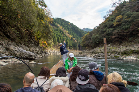 Kyoto, Japan - December 2, 2015: Hozugawa River Cruises are sightseeing boat rides down the Hozugawa River from Kameoka to Arashiyama.のeditorial素材