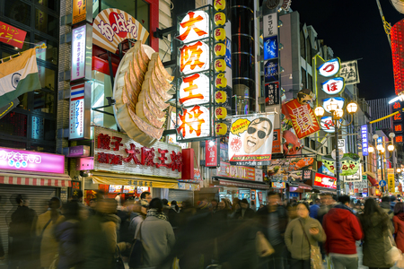 Osaka, Japan - December 4, 2015: in Dontonbori, Namba area. Dotonbori is a popular nightlife and entertainment area characterized by large illuminated signboards.Tourists come to come to see the fancy billboard, shopping and have dinner at night.のeditorial素材