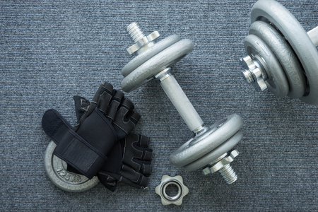 Dumbbell on the gray backgroundの写真素材