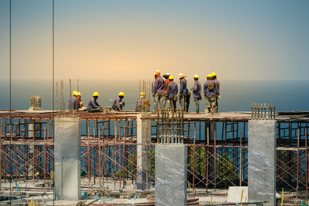 Phuket, Thailand - March 30, 2015 : Unidentified workers are working on the seaside hotel...