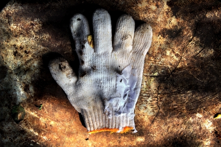 Dirty white gloveの写真素材