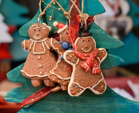 Christmas market in details. Three funny gingerbread cookies - Christmas toys.の写真素材