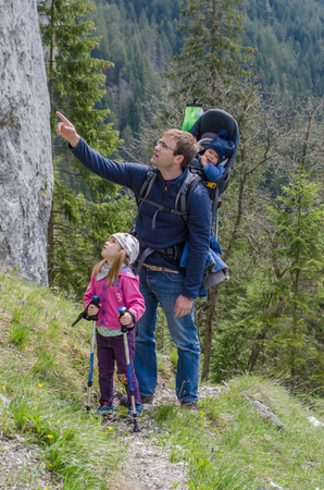 Family hike along the the rocky hillの写真素材
