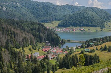 Stunning view over the lake Palcmanska Masa and Dedinky village in Slovakiaの写真素材