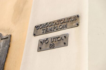 Sign on building facade of Szent Florian catholic church in Budapestの写真素材