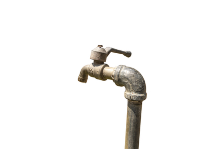 Old faucet on white background with clipping path.の写真素材