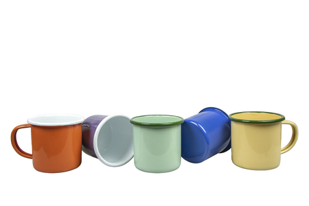 Colourful of tin cups on white background.の写真素材