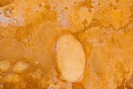 Light brown cement colour old wall background.の写真素材