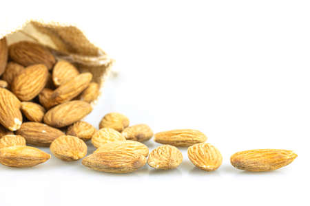 Close up of almond seeds isolate on whtite background.の写真素材