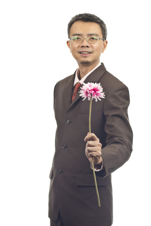 Asian businessman standing on white backgroundの写真素材