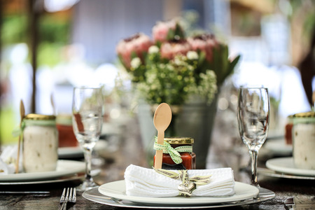 Table decoration with jam and spoon and Proteas