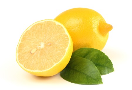 Two lemons with leaves, isolated over whiteの写真素材
