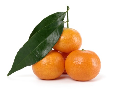 Small heap of ripe mandarins, isolated over whiteの写真素材
