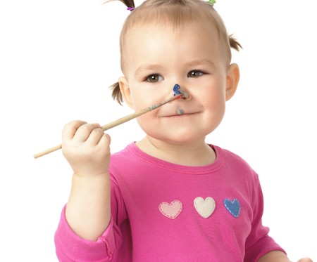 Little girl paint on her nose, isolated over whiteの写真素材