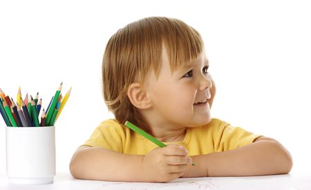 Cute child draw with crayons, isolated over whiteの写真素材