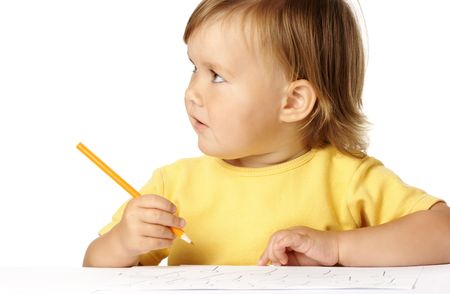 Cute child draw with color crayons, isolated over whiteの写真素材