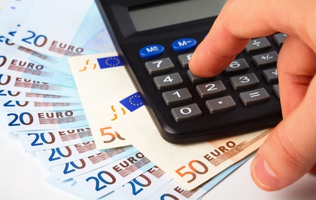 Calculator and few Euros - accounting conceptの写真素材